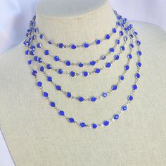 This gorgeous rhodium 80-inch sapphire crystal necklace fits right over your head! No clasps. Wear it as a dynamic single strand, double or triple it! Best for that long shirt look or give a simple outfit a beautiful pop! Makes a stunning wrap-around bracelet https://www.etsy.com/shop/AmysFinery Blue Lariat Jewelry For Party, Blue Crystal Necklace, Simple Outfit, Sapphire Blue, The Head, Long Shirt, Blue Crystals, Sapphire Crystal, Crystal Necklace