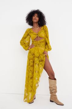 Bouquet lace midi dress with drawstring keyhole at bodice, gathered asymmetrical skirt, long sleeves with functional cuff and open back detail with tie across shoulders.