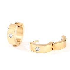 Jeulia simple round cut titanium steel men's hoop earrings, yellow gold huggie earrings, bezel setting solitaire stone. The golden hoop earrings are regarded as a symbol of elegance and classic. Choosing hoop earrings as a gift can express appreciation and good wishes for the recipient, while also conveying a hopeful outlook for the future. Whether as a self gift or for family and friends, yellow gold hoop earrings are a choice that can convey love and care.Weight: 3.9 gWidth: 13 mmHeight: 4 mmM Gold Hoop Earrings With Single Diamond For Gift, Gold Minimalist Huggie Earrings With Diamond, Minimalist Stainless Steel Tarnish Resistant Huggie Earrings, Round Stainless Steel Huggie Earrings As Gift, Classic Stainless Steel Huggie Hoop Earrings, Modern Gold Hoop Earrings With Single Diamond, Stainless Steel Huggie Earrings As Gift, Minimalist Stainless Steel Huggie Jewelry, Classic Stainless Steel Hoop Huggie Earrings