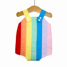 Baby retro rainbow romper. Poppers for easy changing, relaxed fit, plenty of room for nappies (cloth or disposable). Fully lined with light soft cotton. Seamless insides making them comfortable against babies skin. Rainbow design made up of carefully selected colours of 100% premium quality cotton. Adjustable length straps. Summer Bib Front Jumpsuits And Rompers For Playtime, Summer Jumpsuits And Rompers With Bib Front, Multicolor Jumpsuits And Rompers For Spring Playtime, Spring Multicolor Onesie For Playtime, Multicolor Cotton Onesie For Summer, Cute Multicolor Cotton Bubble Romper, Cute Multicolor Jumpsuits And Rompers For Playtime, Summer Multicolor Cotton Onesie, Multicolor Jumpsuits And Rompers For Summer Playwear