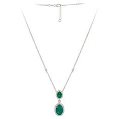 A Rare 18KT White Gold Emerald Diamond Necklace. Necklace is comprised of Finely Set Glittering Gorgeous Emeralds and Diamonds!!! The Emeralds and Diamonds are of Exquisite and Fine Quality. T.C.W. approx 9.50CTS!!! This Gorgeous Necklace is a Sample Piece and Comes with Original tags from the Manufacturer that sold to Important Five Star Hotel Jewelry Stores and shops on Madison Avenue and Rodeo Drive. NWT Original Retail Price: $14,000.00. A Magnificent Breathtaking Masterpiece!!! Diamond Long Necklace, Emerald Diamond Necklace, Rodeo Drive, Five Star Hotel, Madison Avenue, Star Jewelry, Emerald Diamond, Gorgeous Necklaces, Five Star