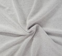 a close up view of a white fabric