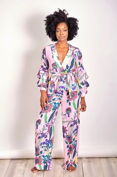 Matchy Matchy. You'll love matching in this gorgeous two piece set with a gorgeous pastel color in a fun floral print. The long sleeve top is kimono style with a self-tie belt and gathering at the sleeves. The wide-leg, high waisted pants are a perfect finish to a perfect 'fit CONTENT & CARE Hand wash with cold water Polyester DEETS & FIT Model is wearing a size Medium Fabric has a little stretch Model profile: Grace is 5'8.5" and measures 34 (bust) 27 (waist) and 42 (hips) Flowery Tops, Model Profile, Trendy Suits, Business Professional Outfits, Kimono Maxi Dress, Floral Two Piece, Model Profiles, Dress Appropriately, Kimono Style