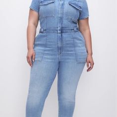 Best Selling Fit For Success Jumpsuit Is As Powerful As It Looks. A Denim Jumpsuit Featuring Hidden Front Zipper Closure And Breast Pockets. Hidden Front Zipper Closure Breast And Pant Pockets Snaps At Waist And Has Optional Belt Short Sleeves Medium Blue Wash Inseam: 28" Fabric: 82% Cotton , 13% Modal , 5% Elastane Care: Machine Wash Cold, Inside Out. Dry Flat Or Hang Dry. For More Info, Please See Our Denim Care Guide. Model Size 16 Is 5'9 And Wearing Size 2xl Fitted High Rise Overalls With Pockets, Fitted High-rise Overalls With Pockets, Fitted Light Wash Denim Overall Jumpsuit, High Rise Fitted Jumpsuits And Rompers With Pockets, High Rise Fitted Jumpsuit With Pockets, Fitted Denim Jumpsuit With Pockets And Straight Leg, Fitted Light Wash Denim Jumpsuit With Pockets, Fitted Mid-rise Light Wash Denim Jumpsuit, Fitted High Rise Denim Jumpsuit For Work