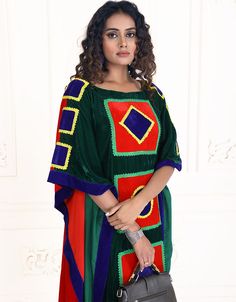 Multi Designer Plam Green Color Velvet Square Work Trendy Kaftan sleeveless with a round neck easy to wear for all age of women Dress belongs to the digital print work with little multi color embroidery at the front and sleeves Hijab and band shown in the image can be bought separately Fabric: VelvetCare: Mild machine wash/ hand Cold Wash/ Dry cleanWe request customers to carefully choose the correct size and dress length referring to our size chart Multicolor Festive Tunic Set, Festive Multicolor Tunic Sets, Festive Multicolor Dabka Kaftan, Multicolor Tunic Kurta For Eid, Multicolor Sleeveless Kurta For Festive Occasions, Festive Multicolor Kaftan, Festive Multicolor Sleeveless Kurta, Green Kaftan With Traditional Patterns, Green Kaftan With Traditional Patterns For Festive Season