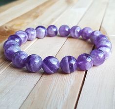 Check out this item in my Etsy shop https://www.etsy.com/listing/470324612/10-mm-amethyst-bracelet-purple-bracelet Energy Yoga, Elephant Bracelet, Purple Bracelet, Women Bracelet, Fire Agate, Bracelet Women, Jewellery Ideas, Protection Bracelet, Amethyst Bracelet