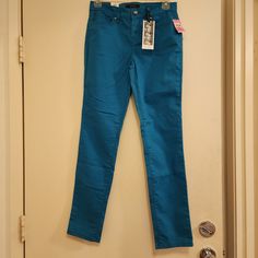 Long Pants. Kiss Me Skinny. Never Used. Nwt. Turquoise Stretch Bottoms, Turquoise Fitted Bottoms For Spring, Fitted Turquoise Bottoms For Spring, Stretch Turquoise Bottoms For Spring, Casual Fitted Turquoise Pants, Fitted Turquoise Casual Pants, Jessica Simpson Workout, Faux Leggings, Floral Joggers