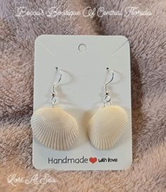 Explore and find your treasure awaiting. They one of a kind natural  shells earrings are going to light up your world. Theses unique earrings are the perfect beach trip accessory. Shell Drop Earrings Jewelry Set, Shell Drop Earrings With Matching Set, Shell Dangle Jewelry For Gifts, Shell Dangle Jewelry Gift, Summer Gift Jewelry Shell-shaped, Shell-shaped Jewelry For Summer Gifts, Shell-shaped Jewelry With Matching Earrings For The Beach, Summer Gift Shell-shaped Earrings, Summer Shell Jewelry Gift