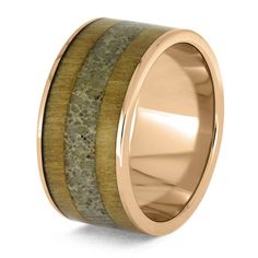 a wedding band with two wood inlays and an antelope stone center