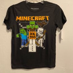 Boy’s Minecraft Halloween Short Sleeved Graphic Tee. Condition Is Brand New With Tags! Sizes Available: X-Small Medium Playful Black T-shirt For Fall, Themed Black Top With Character Print, Themed Black Tops With Character Print, Themed Black Cotton Tops, Black Cotton Themed Tops, Minecraft Halloween, Minecraft Shirts, Holiday Packing, Boys Top