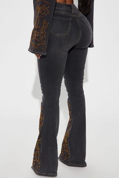 Available In Black Wash. Pair With Lone Ranger Embellished Denim Jacket Flare Jean 5 Pocket Embellished 34" Inseam 11" High Rise Medium Stretch Disclaimer: Due To The Specialized Wash Process, Each Garment Is Unique. 72.5% Cotton 25.6% Polyester 1.9% Spandex Imported | Lone Ranger Embellished Stretch Flare Jeans in Black Wash size 13 by Fashion Nova Trendy Embroidered Fall Jeans, Trendy Embellished Bottoms For Fall, Fitted Embellished Bottoms For Fall, Trendy Rhinestone Bottoms For Fall, Fall Denim Jeans With Rhinestones, Trendy Fitted Jeans With Rhinestones, Embellished Denim Bottoms For Fall, Fall Embellished Denim Bottoms, Fall Bottoms With Rhinestones