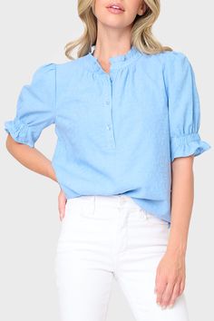 This light and airy top features a button henley placket, a feminine ruffle detail at the neck, and feminine blouson elbow sleeves. 100% Cotton Delicate Wash Cycle, Dry Flat. Length 26" (size small) Jorgen is 5'5 and wearing size XXS in Sky Blue. Casual Business Attire For Women, Casual Outfits For Women Work, Women Business Casual Outfits, Outfits For Women Work, Preppy Pinterest, Business Attire For Women, Women Work Blouse, Blue Shirt Women, Light Blue Blouse