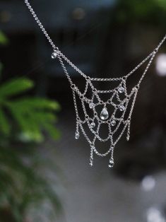 Spiderweb Crystal Silver Necklace | Jewelry | Three Fleas Bohemian Silver Crystal Clavicle Chain Necklace, Bohemian Silver Crystal Necklace With Clavicle Chain, Bohemian Silver Drop Jewelry, Gothic Sterling Silver Necklaces For Parties, Gothic Crystal Jewelry For Gift, Silver Teardrop Crystal Necklace For Party, Unique Silver Drop Necklaces, Unique Silver Drop Necklace, Ethereal Sterling Silver Jewelry