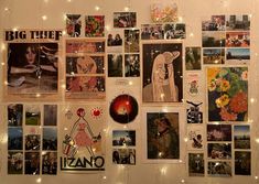 the wall is covered with pictures and lights