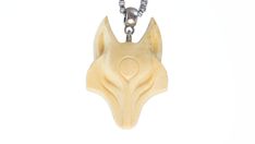 White Wolf Necklace DETAILS   - Dimensions:   - Height 1.5 Inches  (35mm)   - Width  1 Inches   (26mm)   - Thickness 0.3 Inches (6mm)   - Weight 0.09 Oz  (3 grams)   - The pendant is completely handmade.   - The Pendant is made of  Exotic wood Burl   - Each pendant is packed in a white gift box.   - Before buying, be sure to visit my YouTube channel to see your pendant before ordering.  SHIPPING   - United States: 1-2 weeks (sometimes longer)   - Canada: 3-5 weeks   - France: 3-5 weeks   - Germa Wolf Amulet, Wolf Totem Necklace, Wooden Wolf Pendant, Wolf Crystal Necklace, Elemental Magic, Wolf Necklace, White Wolf, Viking Jewelry, Wood Pendant