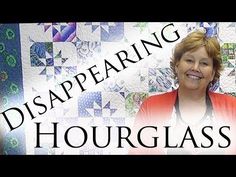 a woman standing in front of a quilt with the words disaparing hourglass