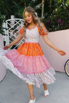 The patchwork dress of your DREAMS now available in bright and bold colors! The Emily Dress features the most fashion forward design, consisting of orange, pink, and stunning floral fabric. She also has an Ivy Favorite smocked bodice, tiered skirt, and dainty puff sleeves. This dress screams, "Ready for Summer" and will be your go-to dress for all your upcoming adventures! Available in size XXS, XS, S, M, L, XL, XXL, 1X, 2X, 3X, 4X, & 5X + kids! Spring Tiered Patchwork Dresses, Spring Patchwork Tiered Dresses, Pink Patchwork Dress For Spring, Spring Pink Patchwork Dress, 36 Weeks Pregnant, Ivy City Co, Bodice Dress, Patchwork Dress, Tier Skirt