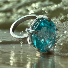 Introducing our stunning Aqua Marine Rings ! A timeless symbol of elegance and beauty! Dive into this world of mesmerizing blue hues that capture the essence of the ocean. Each ring is meticulously crafted to perfection, exuding a sense of luxury and sophistication. Whether you're looking for a statement for a special occasion or a daily reminder of the sea, our Aqua Marine Rings are the perfect choice. Let the refreshing energy of aqua marine inspire you and elevate your style to new heights. Make a splash with your jewelry collection and indulge in the allure of Aqua Marine Rings. Order yours today and experience the magic of the sea at your fingertips. Ocean-Inspired Beauty you must wear the ocean's hues on your finger! We offer them here at Amazonian Girl in 18K Gold and Silver. And In Elegant Ocean Color Jewelry For Gifts, Blue Round Solitaire Emerald Ring, Sterling Silver Oval Emerald Ring, Blue Solitaire Emerald Ring, Round Shape, Luxury Blue Oval Emerald Ring, Blue Solitaire Emerald Ring Round Shape, Luxury Oval Emerald Ring With Vs Clarity, Timeless Oval Emerald Ring In Sterling Silver, Modern Aquamarine Oval Rings