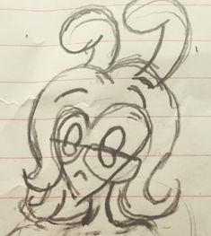 a drawing of a cartoon character on lined paper