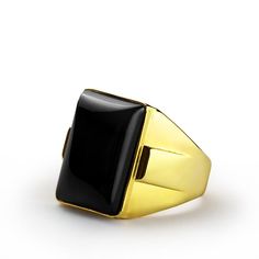 Metal: 14k Yellow Gold Onyx: 1.3cm x 1.8cm (0.5" x 0.7") shape - cabochon setting type - Bezel setting Product weight: 10.0 gr Compelling color and bold design help you make a strong style statement! Power and beauty come to mind in the presence of this stunning 14k gold ring. One large onyx cabochon anchors the piece at the center. The right ring can speak volumes about your personal taste and aesthetic. ----------------------------------------------------------------------Onyx The myth of the Classic Black Onyx Rings, Black Cabochon Ring In 14k Gold, Black Cabochon 14k Gold Rings, Black 14k Gold Cabochon Ring, Black Cabochon Signet Ring For Formal Occasions, 14k Gold Black Cabochon Rings, Formal Black Cabochon Signet Ring, Modern Onyx Rings For Formal Occasions, Black Luxury Signet Ring For Formal Events