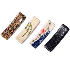 four different types of hair clips in various colors and patterns on a white background,