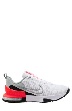 the nike air zoom sneakers are white and red