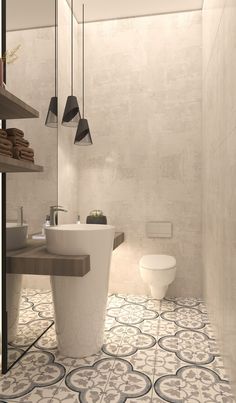 a bathroom with a toilet, sink and bathtub next to a shelf filled with towels