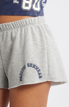 Love to lounge in these soft cotton-blend shorts stamped with a logo design and finished with undone hems. 2" inseam; 28" leg opening; 10" front rise; 15" back rise (size Medium) Elastic waist 60% cotton, 40% polyester Machine wash, tumble dry Imported Summer Cotton Activewear With Elastic Waistband, Sporty Cotton Pajama Shorts For Loungewear, Cotton Activewear For Summer Loungewear, Cotton Activewear For Summer Lounging, Summer Cotton Activewear For Loungewear, Relaxed Fit Cotton Athletic Shorts For Leisure, Cotton Summer Activewear For Lounging, Summer Cotton Activewear For Lounging, Summer Cotton Loungewear Activewear