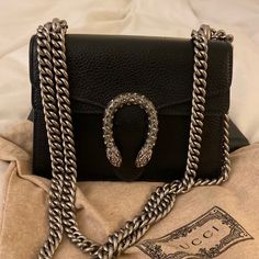 Excellent Condition, Black And Swarovski Crystals. Grained Leather, Very Durable. Paid $2600 Plus 10% Tax. Comes With Gucci Dust Bag. Gucci Dionysus Black, Black Purse, Black Purses, Gucci Dionysus, Gucci Bag, Black Silver, A Couple, Swarovski Crystals, Dust Bag