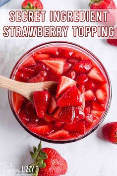 strawberries in a glass bowl with the title secret ingredient strawberry topping