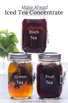 three jars filled with different types of tea