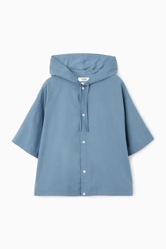 Rendered in a mid-wash denim, this hooded shirt marries contemporary street-style with classic tailoring. It boats subtle pleating at the rear with straight-cut short slevevs and two side pockets. Internal drawstrings wrap the hem, mirroring those falling from the hood. Relaxed fitFront button fasteningDrawstring hood and hem Shell: 100% Cotton. Excluding trims / Machine wash Back length of size M is 68.4cm / Model wears a size M Hooded Shirt Jacket, Summer Cotton Hooded Outerwear, Summer Hooded Tops With Pockets, Hooded Summer Top With Pockets, Summer Tops With Drawstring Hood Relaxed Fit, Summer Tops With Drawstring Hood And Relaxed Fit, Summer Relaxed Fit Tops With Drawstring Hood, Summer Cotton Hoodie With Short Sleeves, Hood Style