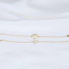 Mother Daughter bracelet set Mother's bracelet: - 14K gold charm is about 14mm x 10mm. - 14K gold 1.3mm cable chain Daughter's bracelet: - 14K gold heart charm is about 8mm x 6mm. - 14K gold 1.3mm cable chain 14K gold components To see other Mother daughter set click here: https://www.etsy.com/shop/SashJewelry?section_id=12441134&ref=shopsection_leftnav_1 To see more children's jewelry click on the link below. http://www.etsy.com/shop/SashJewelry?section_id=12441132 To see more Sash Jewelry Adjustable Gold Luxury Heart Bracelet, Elegant 14k Gold Filled Heart Bracelet Gift, Elegant Heart Bracelet With Charms, Elegant 14k Gold-filled Heart Bracelet Gift, Hypoallergenic Yellow Gold Heart Pendant Jewelry, Luxury Adjustable Gold Heart Bracelet, 14k Yellow Gold Bracelets As A Gift For Her, 14k Yellow Gold Bracelets, Gift For Her, 14k Gold Yellow Gold Charm Bracelet With Heart Charm