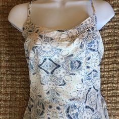 Boho Top, Nwt, Straps Cross In The Back And Are Adjustable. Super Cute Top, Just Don't Have Room For Anymore Items In My Little Closet. Two Button Closures; Extra Button Included With Tag. White Paisley Print Top For Vacation, White Paisley Print Top For Beach, White Paisley Print Vacation Tops, Blue Bohemian Button-up Top, Blue Bohemian Cami Tank Top, Bohemian Cotton V-neck Camisole, Floral Print V-neck Tank Top For Beach, Floral Print V-neck Camisole, Strappy Tank Tops