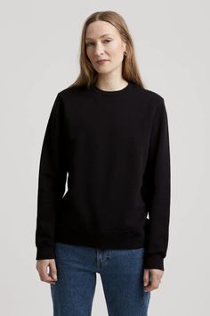 Upgrade your wardrobe with our Sweatshirt, the embodiment of comfort and durability. Made from 100% organic cotton, experience unmatched softness in this essential piece. Relaxed Fit Washed Black Sweatshirt With Pockets, Washed Black Cotton Sweatshirt, Black Sweatshirt Women, Soft-washed Cotton Sweatshirt In Washed Black, Black Moisture-wicking Cotton Sweatshirt, Black Cotton Sweatshirt Soft-washed, Upgrade Your Wardrobe, Sweatshirts Women, Cool Style