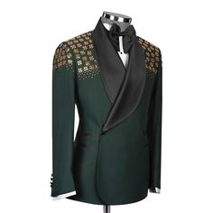 Package Includes: 1 x Jacket - 1 x Pant

Introducing the custom green tuxedo with stone embroidery, crafted from luxurious 120s fabric with a silk lining. This all-season tuxedo features a double-breasted jacket with a shawl lapel, three straight pockets, and stunning stone embroidery on the shoulders. The flat-front trousers include two back pockets and a zip closure, ensuring style and functionality. Perfect for any formal occasion, this tuxedo combines elegance and impeccable craftsmanship.

 	Fabric: 120s 
 	Lining Fabric: Silk
 	Pattern: Plain
 	Buttons: Fabric
 	Construction: Half Canvas
 	Seasonality: All Season
 	Jacket: Shawl Lapel, 3 Straight Pockets, Stone Embroidery on Shoulder, Double Breasted
 	Trouser: Flat front, 2 Back Pockets, Zip Closure Luxury Tailored Embellished Tuxedo, Luxury Embellished Tailored Tuxedo, Elegant Green Evening Blazer, Luxury Long Sleeve Tuxedo For Ceremony, Festive Luxury Long Sleeve Tuxedo, Luxury Embellished Tuxedo, Formal Tailored Embroidered Tuxedo, Semi-formal Tailored Embroidered Tuxedo, Formal Embroidered Tailored Tuxedo