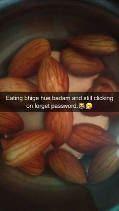 some almonds in a pot with the caption saying eating bingle hue badam and still clicking on forgot password