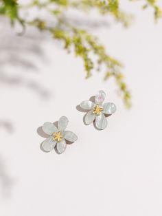 Introducing our  Floral Statement Stud Earrings, meticulously crafted to capture the essence of Spring and Summer in a delicate flowery design. Each pair of earrings is adorned with a floral/daisy motif, designed to evoke blooming flowers' vibrant colors and gentle allure. Handmade with precision and care, these earrings celebrate nature's beauty, bringing a touch of botanical elegance to any outfit. Our statement studs are crafted from acrylic and offer a perfect blend of durability and lightwe Petal Shaped Flower Earrings As Gift, Feminine Flower Shaped Earrings For Gift, Flower Shaped Pearl Earrings For Gift, Delicate 3d Flower Earrings As Gift, Delicate Petal Shaped Flower Earrings As Gift, Elegant Wedding Earrings With Birth Flower, Handmade Feminine Flower Earrings For Gifts, Delicate Flower Earrings With 3d Flowers As Gift, Delicate Petal Shaped Jewelry With Matching Earrings