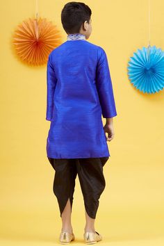 Product Features: Top Color: Blue Bottom Color: Black Work: Embroidered Top Fabric: Art Silk Bottom Fabric: Art Silk Pack Of: 1 Kurta and 1 Peshawari Occasion: Festive Disclaimer: There will be slight difference in digital to actual image