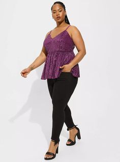 FIT Model is 5'10” wearing size 1. . Measures 28” from shoulder (size 2). MATERIALS + CARE Sequin woven fabric. 96% polyester, 4% spandex. Dry clean only. Imported. DETAILS Deep v-neck. Sleeveless. Sequined detail. . Peplum detail. . The best plus size women's peplum sequin v-neck tank sleeveless & tops in phlox made of sequin. Rock your look from Torrid to Festivals like Coachella and Lollapalooza, a concert, a show, or just for fun! Torrid is your destination for cozy fall and winter clothes t Purple V-neck Tank Top For Party, Fitted Purple V-neck Tank Top, Purple Stretch V-neck Tank Top, Cozy Fall, Lower Case Letters, Just For Fun, Deep V Neck, Deep V, Woven Fabric