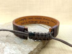 BRACELET DETAILS ☆ Laser engraved leather bracelet, ☆ Leather color options, ☆ Handmade adjustable bracelet, ☆ Hemp rope ☆ Cuff width: 5/8" (1.6cm) ☆ The writing has been burned into the leather and will not fade away with wear. NOTE: Due to the nature of the material, the shade of leather can vary slightly from that pictured. BRACELET FUTURES Memorial Handwriting Bracelet, Actual Handwriting Bracelet ☆ Best personalized gifts ☆ Express your personality ☆ Unique gifts ☆ Engrave your idol's signa Personalized Brown Leather Bracelet For Everyday, Personalized Brown Leather Bracelet For Father's Day, Personalized Brown Leather Bracelets, Adjustable Leather Bracelet With Engraving Option, Hand Stamped Brown Bracelets As Gift, Adjustable Engraved Leather Bracelet For Everyday, Hand Stamped Brown Bracelets For Gifts, Father's Day Adjustable Engraved Leather Bracelet, Father's Day Engraved Adjustable Leather Bracelet