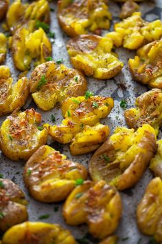 the potatoes have been cooked and are ready to be eaten with seasoning sprinkled on them