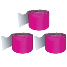 three rolls of pink duct tape on white background