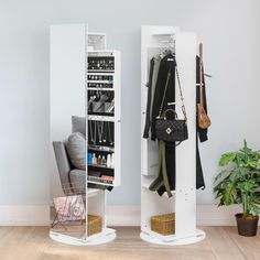 two white shelving units with purses and handbags on them