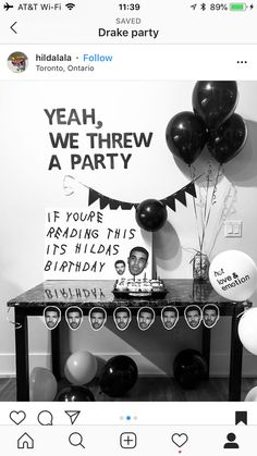 a table with balloons and pictures on the wall behind it that says yeah, we threw a party