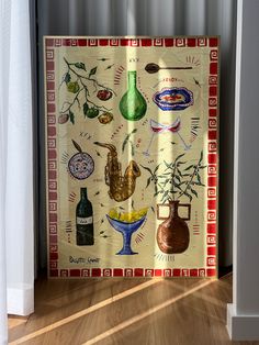 a kitchen curtain with various items on it