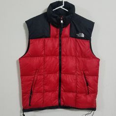 North Face Mens Retro Nuptse Vest Product Details Brand - The North Face Color - Red / Black Size - Men's Medium Condition - Excellent Measurements Top To Bottom Length - 27" Pit To Pit - 22.5" #Tags - Coats Jackets Winter Retro Puff Bubble Thermoball Nupse Thermal Puffy Waterproof Guys Men Heavy Cold Weather A20 (Id-5-76) The North Face Red Winter Outerwear, Red The North Face Winter Outerwear, Red Windproof Nylon Outerwear, Red Nylon Outerwear For Outdoor, Red The North Face Outdoor Outerwear, Functional Red Outerwear For Outdoor Activities, Functional Red Outerwear For Outdoor, Red Winter Hiking Outerwear, Functional Red Outerwear For Hiking