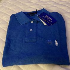 New Rl Polo Shirt. Size Medium, Blue, Classic Fit. Blue Ralph Lauren Polo Shirt, Ralph Lauren Blue Collared Shirt, Blue Collared Ralph Lauren Shirt, Blue Ralph Lauren Cotton Tops, Casual Blue Ralph Lauren Shirt, Blue Long Sleeve Cotton Polo Shirt, Ralph Lauren Blue Polo Collar Shirt, Blue Cotton Ralph Lauren Polo Shirt, Ralph Lauren Blue Collared Top