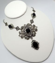 "This is a new handmade necklace. It is made with antiqued silver plated filigrees, accented with high quality BLACK glass rhinestones. Decorated portion is 7\" wide and 3 1/4\" tall in the center. Necklace is adjustable 15-18\" with a lobster clasp and chain extender. If you would like a different length, please send us a message." Nickel-free Gothic Necklaces For Party, Gothic Silver Necklaces For Festival, Gothic Filigree Metal Jewelry, Gothic Antique Silver Jewelry With Intricate Design, Gothic Silver Festival Jewelry, Gothic Metal Jewelry With Filigree, Gothic Silver Jewelry For Festival, Gothic Silver Pewter Jewelry, Gothic Pewter Jewelry In Silver