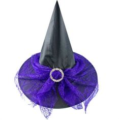 a purple witches hat with a ring on it